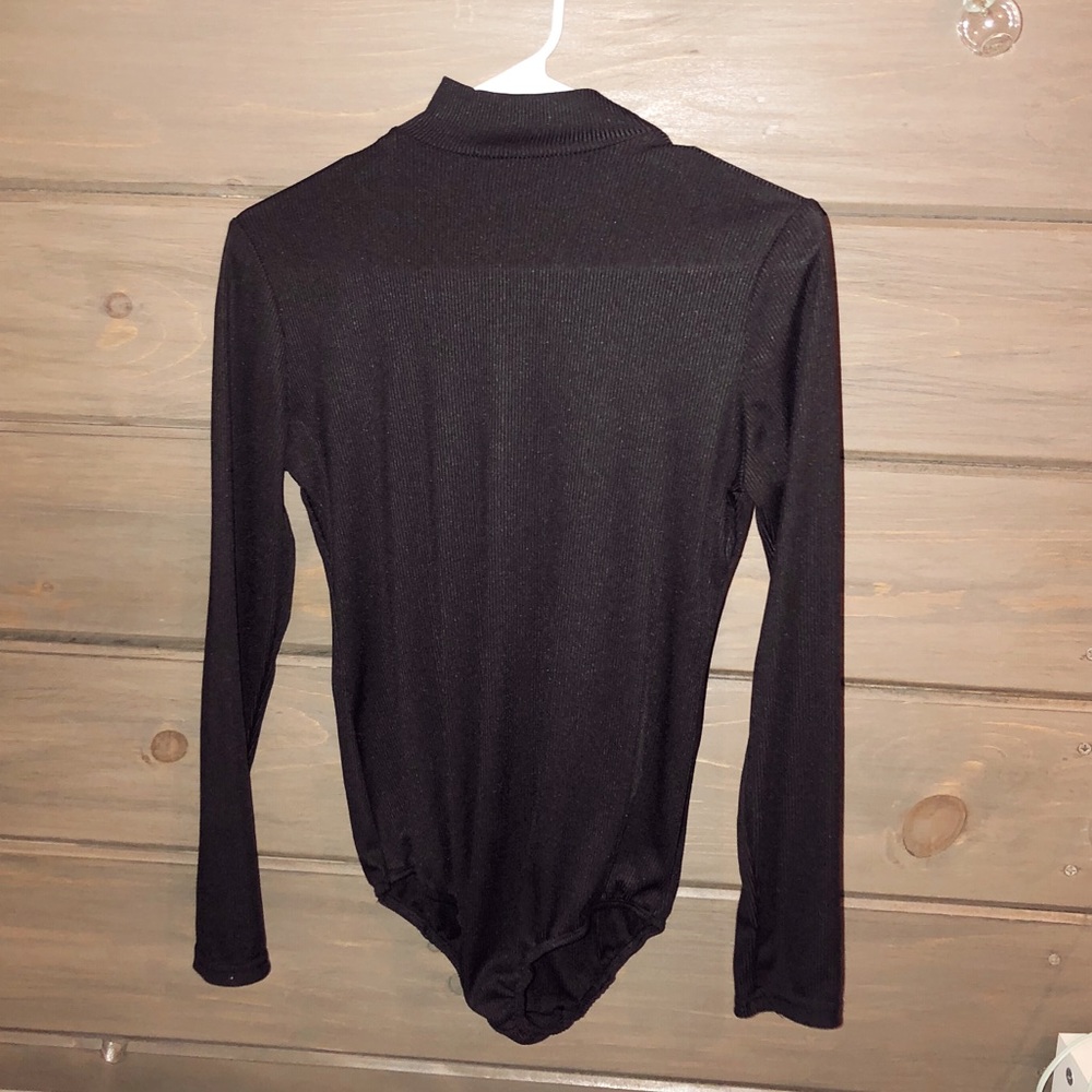 Black turtle neck bodysuit